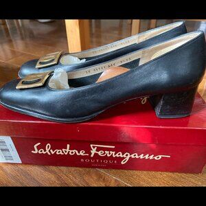 Salvatore Ferragamo black pumps with gold buckle